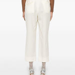 Pantaloni affusolati in bianco Comme Des Garçons - donna 