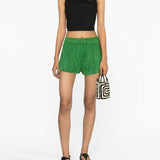 Shorts metallizzati Lumière in verde Oséree - donna 