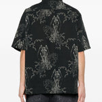 Camicia a maniche corte con fantasia in nero Our legacy - uomo 