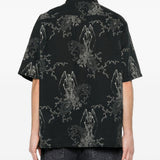 Camicia a maniche corte con fantasia in nero Our legacy - uomo 
