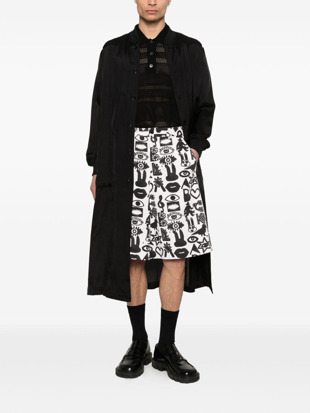 Shorts con stampa Fantasia in nero e bianco Comme des garcons black - unisex 