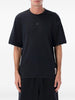 T-shirt con logo in nero Satisfy - unisex