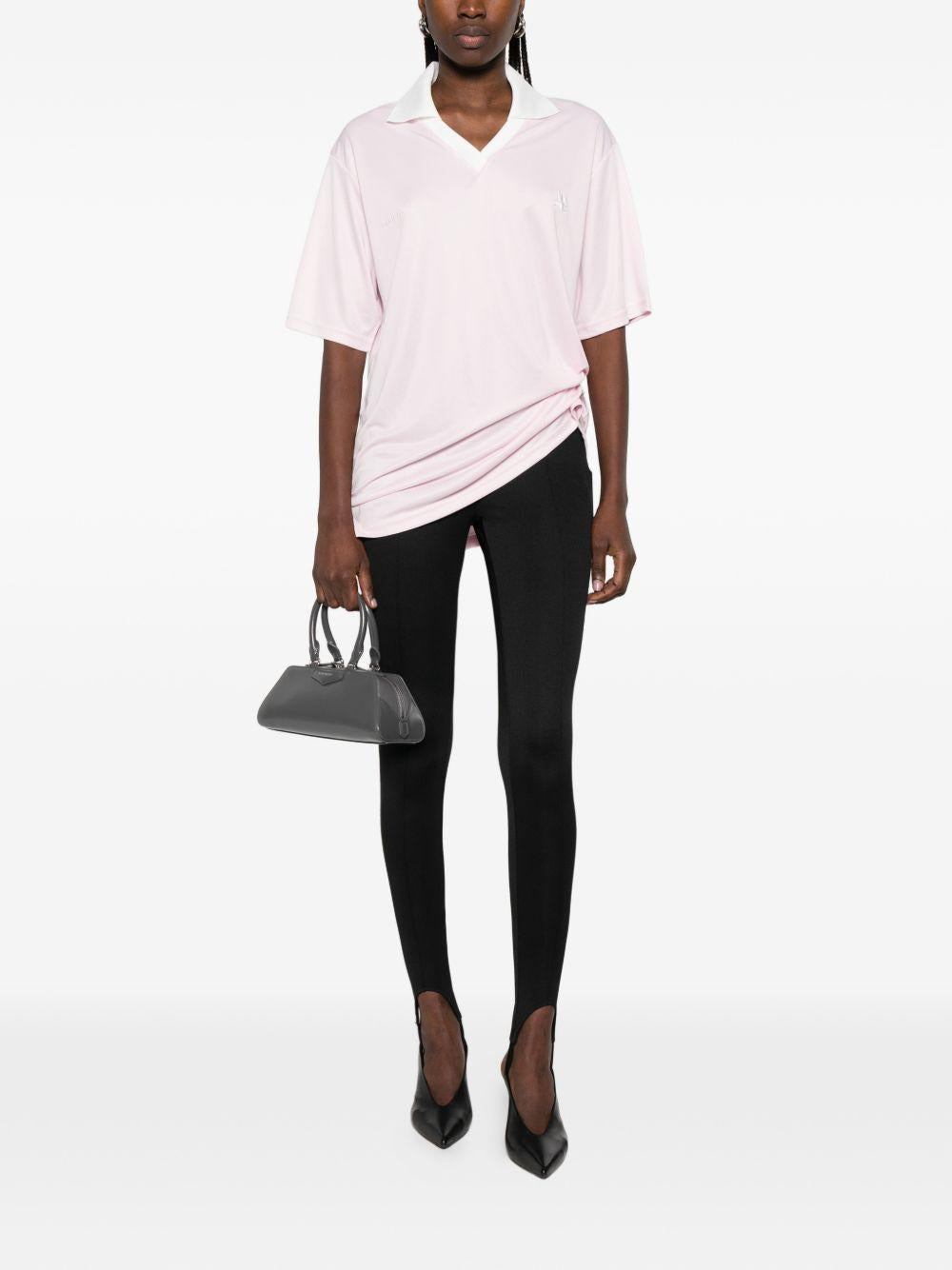 Polo con logo e ricamo a v in bianco Courrèges - donna 