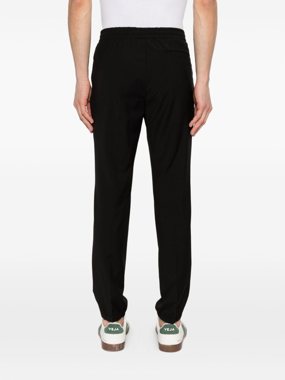 Pantaloni con chiusura nascosta in nero Zegna - uomo 