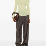 Top a maniche lunghe con design plissettato in verde lime Issey miyake  - donna 