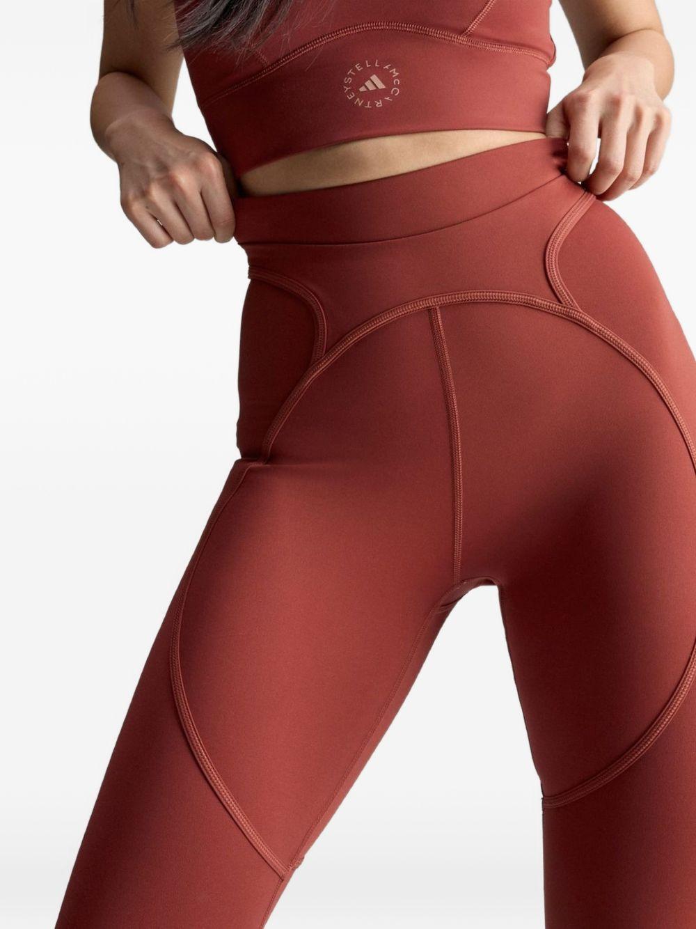 Leggings con logo in rosa cipolla Adidas by stella mc cartney - donna 