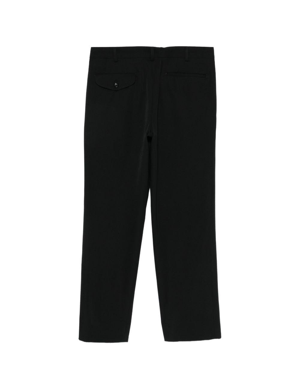 Pantaloni con zip in nero Comme des Garçons Homme Plus - uomo 