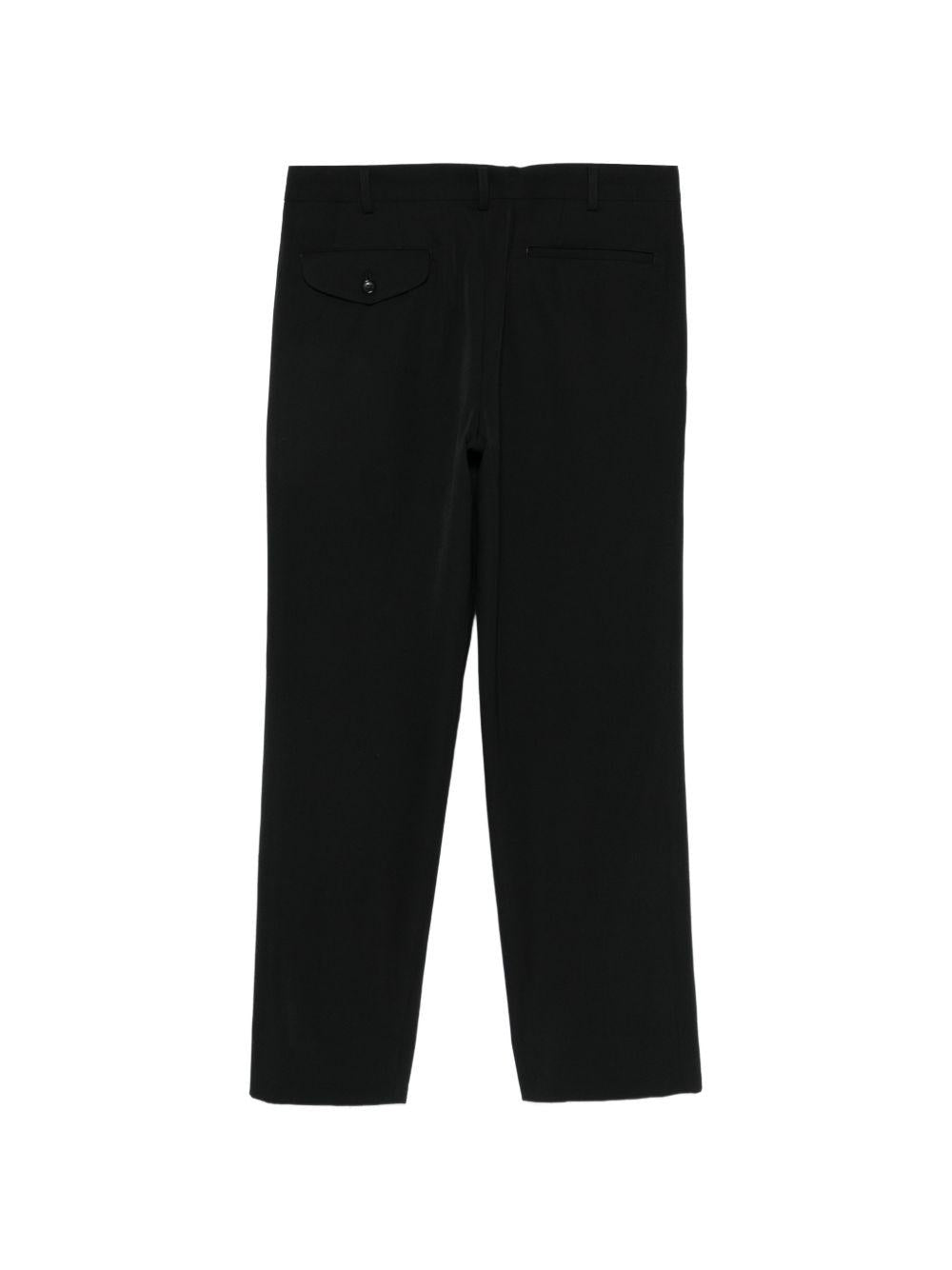 Pantaloni con zip in nero Comme des Garçons Homme Plus - uomo 