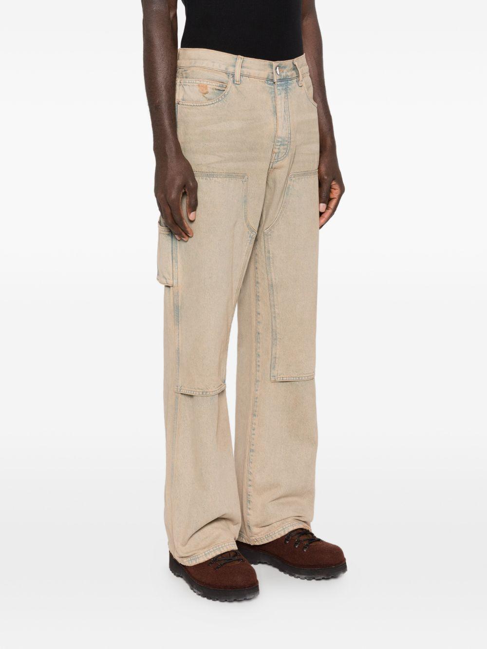 Jeans con tasche in beige Amiri - uomo 