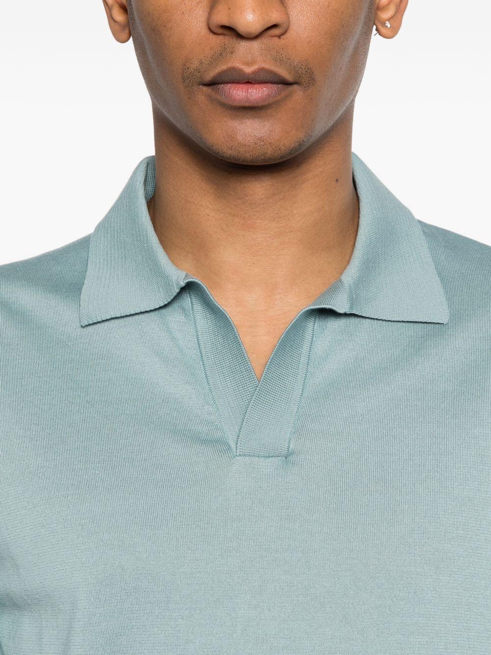 Polo a maniche corte con scollo a v in azzurro Lardini - uomo 