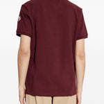 Polo con dettaglio a righe in piquet in rosso Moncler - uomo 