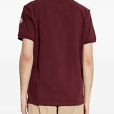Polo con dettaglio a righe in piquet in rosso Moncler - uomo 