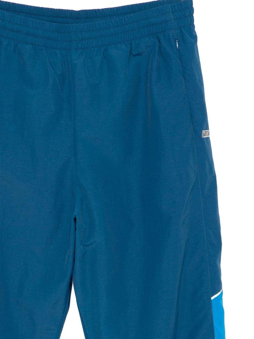 Pantaloni con pannelli laterali in blu Martine rose - unisex 