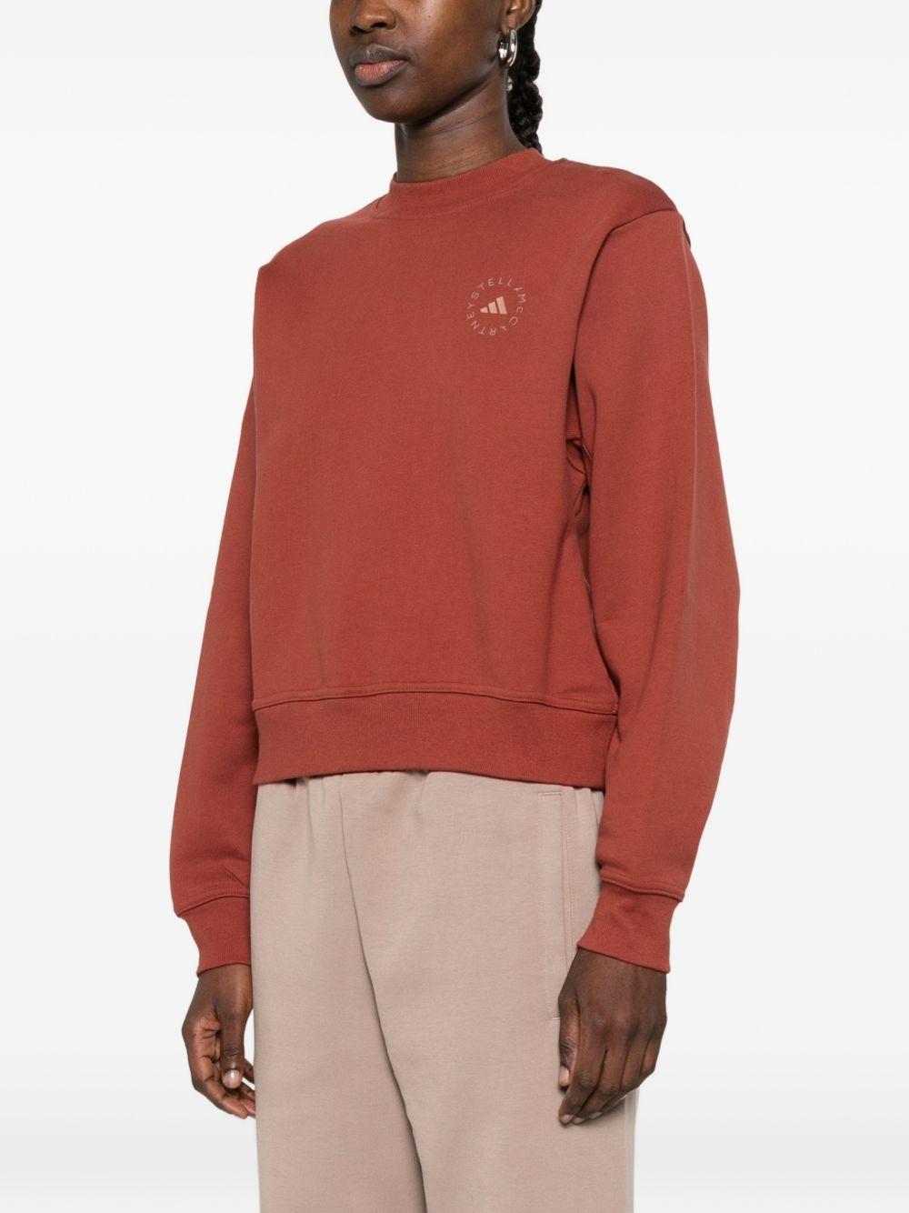 Felpa con logo a maniche lunghe in rosso mattone Adidas by stella mc  cartney - donna 