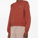 Felpa con logo a maniche lunghe in rosso mattone Adidas by stella mc  cartney - donna 