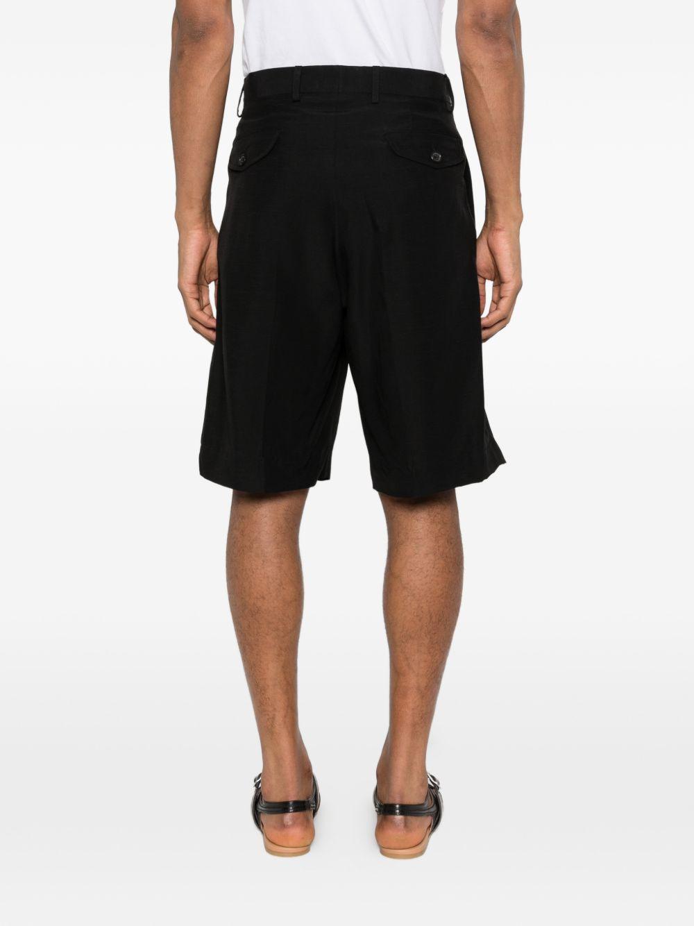 Pantaloncini con pieghe in nero Laneus - uomo 