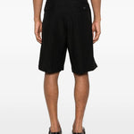 Pantaloncini con pieghe in nero Laneus - uomo 