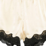 Pantaloncini con bordo in pizzo e fiocco decorativo in beige Rotate x love stories - donna 
