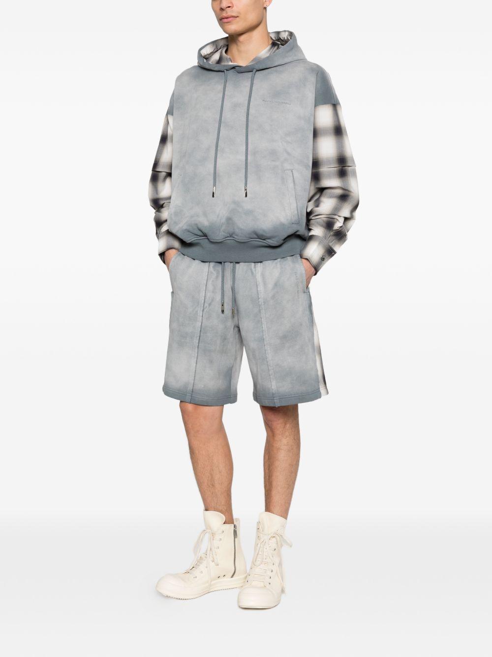 Felpa con maniche a quadri in grigio Feng chen wang - uomo 