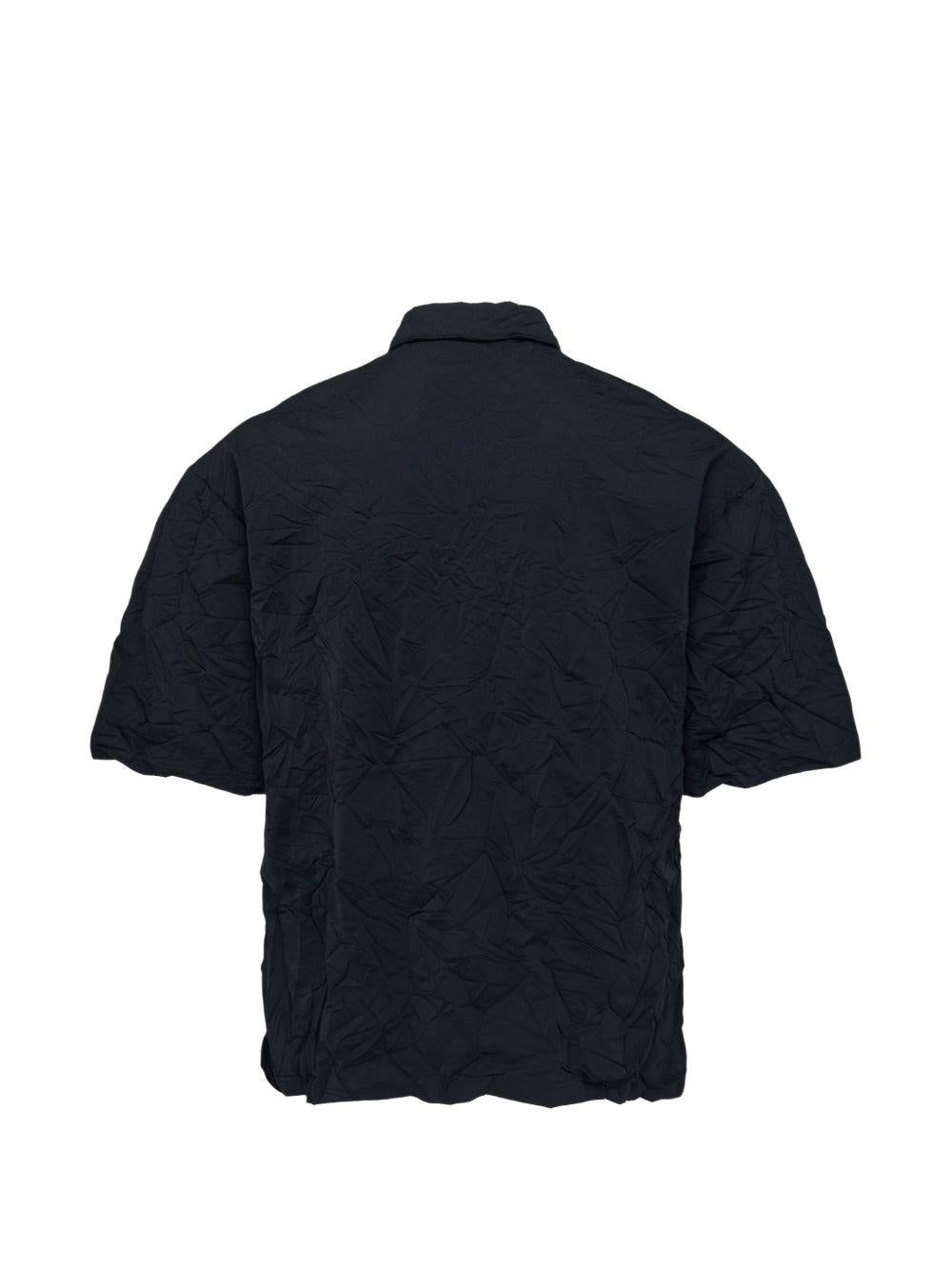 Polo a maniche corte in nero Comme des garcons homme - uomo 