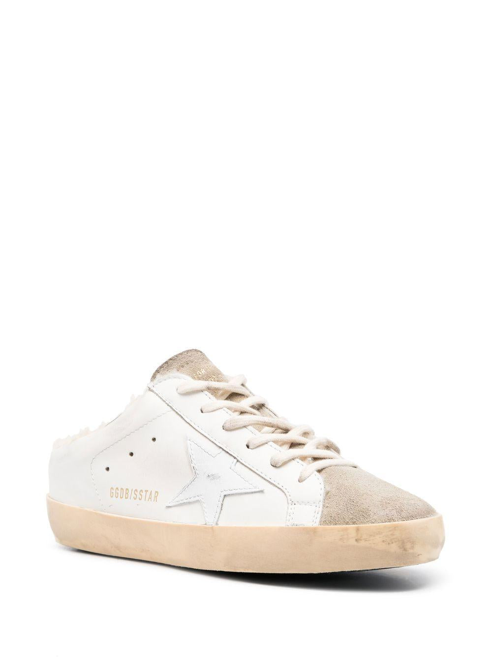 Mules Super Stat in bianco e beige 