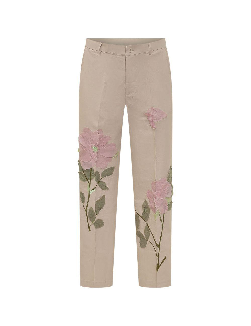 Pantaloni con dettaglio fiori in beige KidSuper - uomo 