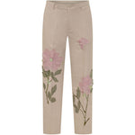 Pantaloni con dettaglio fiori in beige KidSuper - uomo 