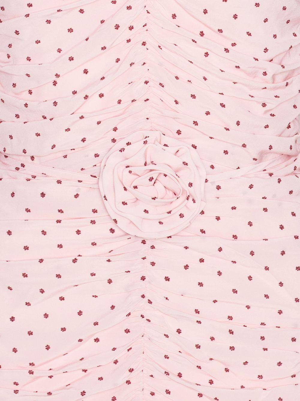 Abito con ruches a pois in rosa 