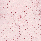 Abito con ruches a pois in rosa 