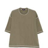 T-shirt con cuciture a contrasto in verde Comme des garcons homme - uomo 