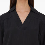 T-shirt con scollo a v ermo in nero Loulou de saison - donna 