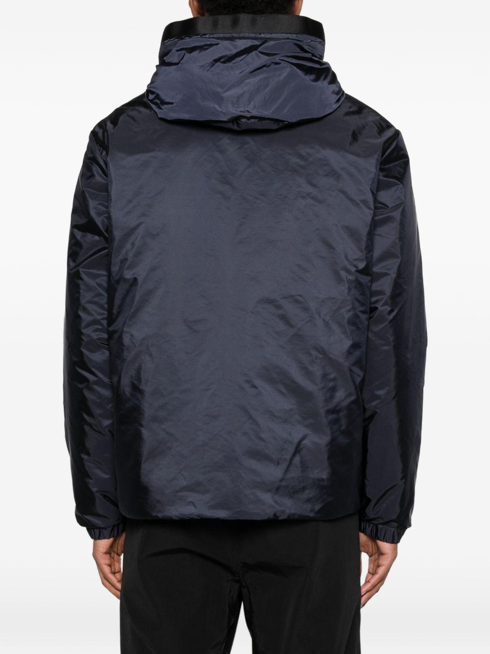 Piumino con cappuccio e logo in blu Moncler - uomo 