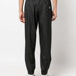 Pantaloni elasticizzati con coulisse in nero Rains - donna 