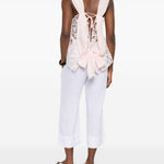 Top in pizzo con motivo floreale in rosa Maurizio - donna 