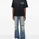 Jeans bootcut in blu Amiri - uomo 