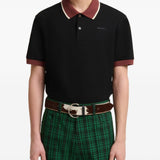 Polo con colletto a contrasto in nero e marrone 