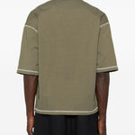 T-shirt con cuciture a contrasto in verde Comme des garcons homme - uomo 