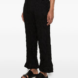 Pantaloni a gamba ampia in nero Gongdid design - uomo 