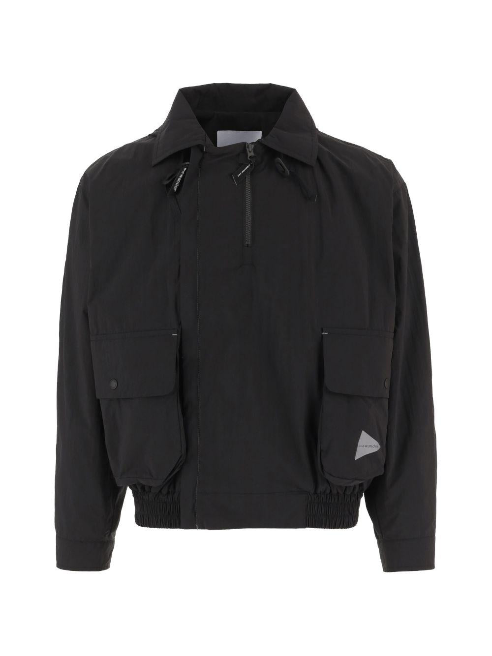 Giacca con cappuccio in nero And wander - uomo 
