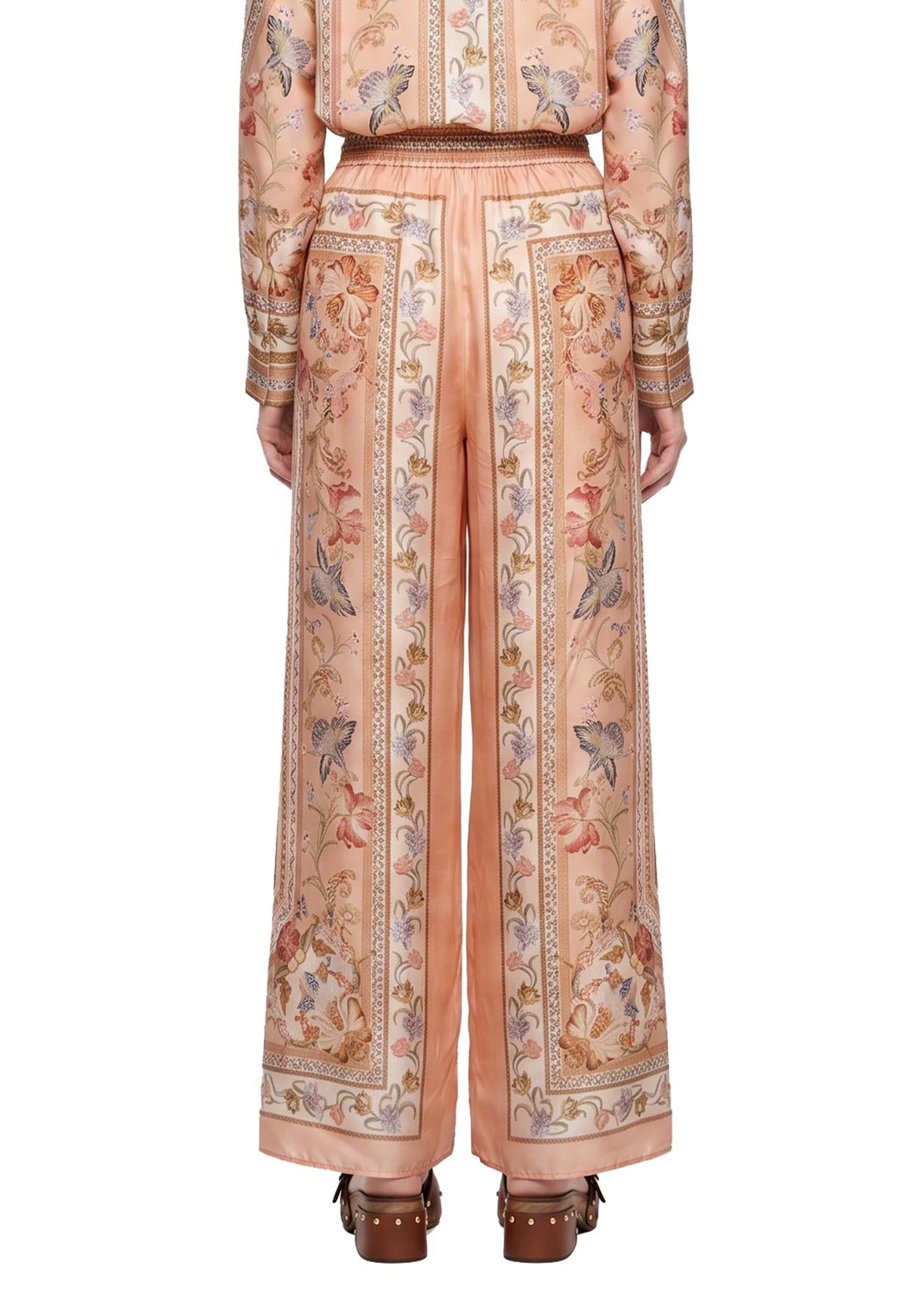 Pantaloni Roselight in seta floreale rosa 