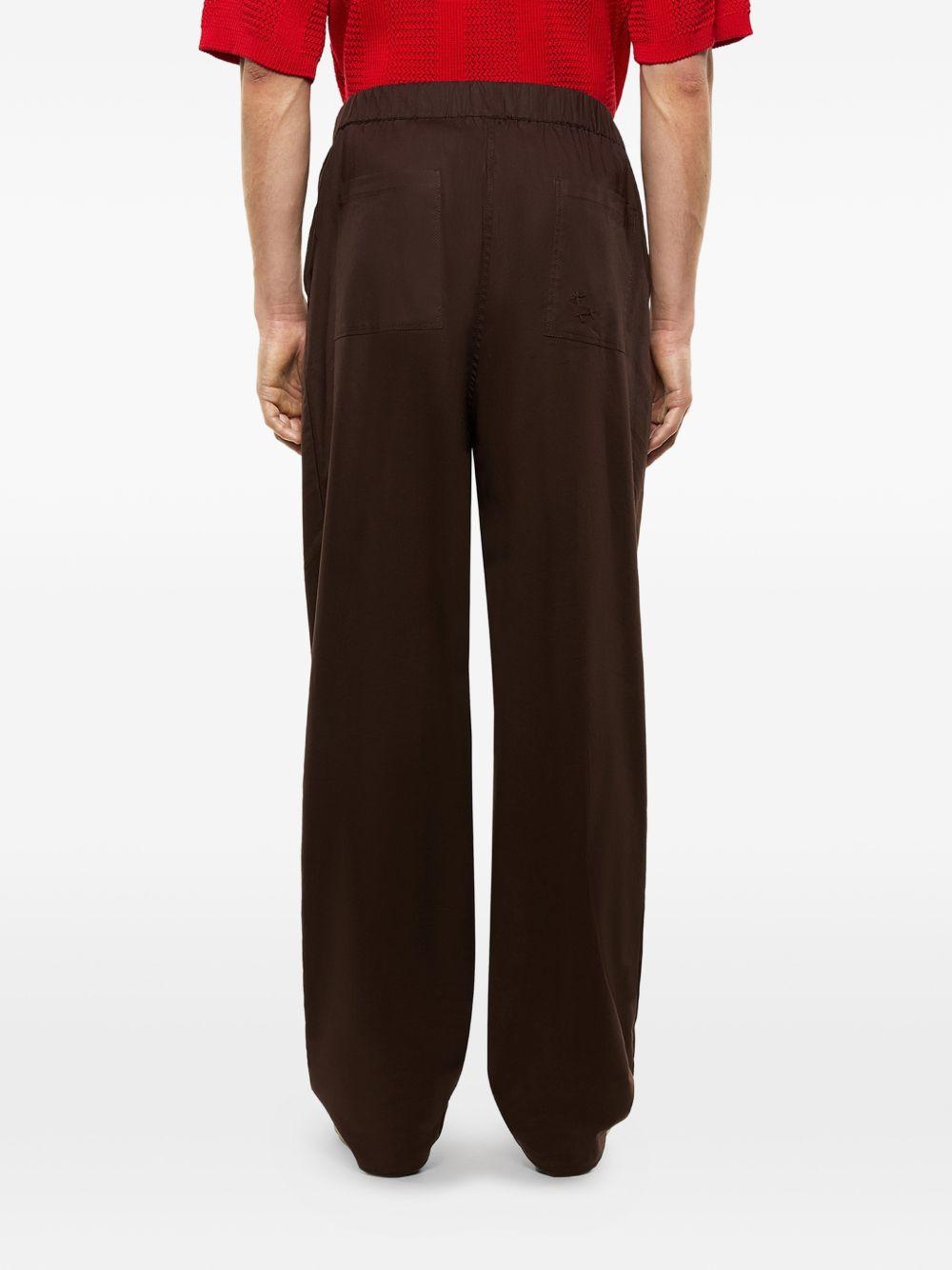 Pantaloni Melrose con ricamo in marrone Laneus - uomo 
