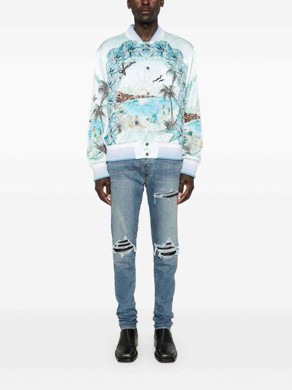 Jeans con strappi in blu 