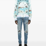Jeans con strappi in blu 