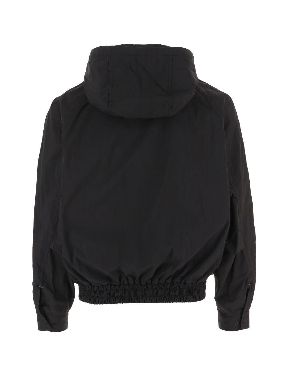 Giacca con cappuccio in nero And wander - uomo 