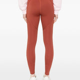 Leggings con logo in rosso terracotta Adidas by Stella Mc Cartney - donna 