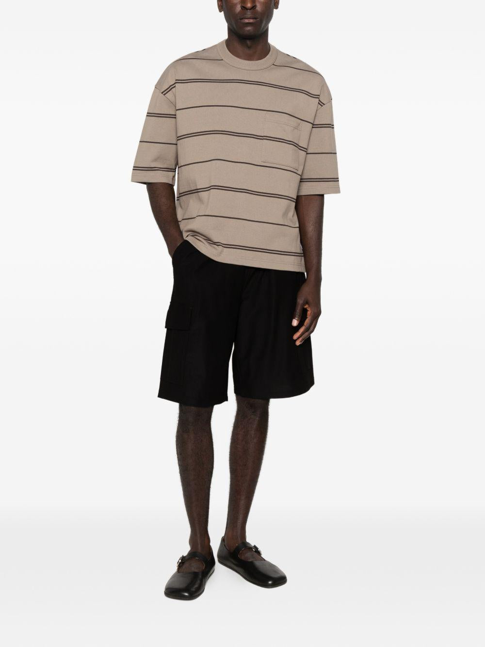 T-shirt a righe con taschino sul petto in beige Comme des garcons homme - uomo 