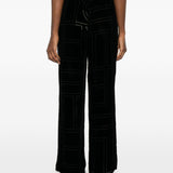 Pantaloni da pigiama monogram devoré in nero Toteme - donna 