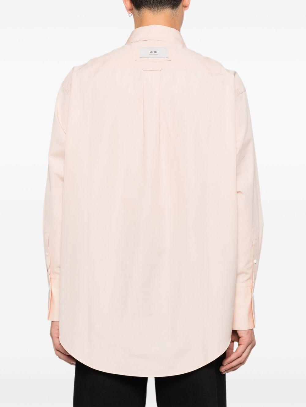 Camicia con logo posteriore in rosa chiaro Ami Paris - unisex 