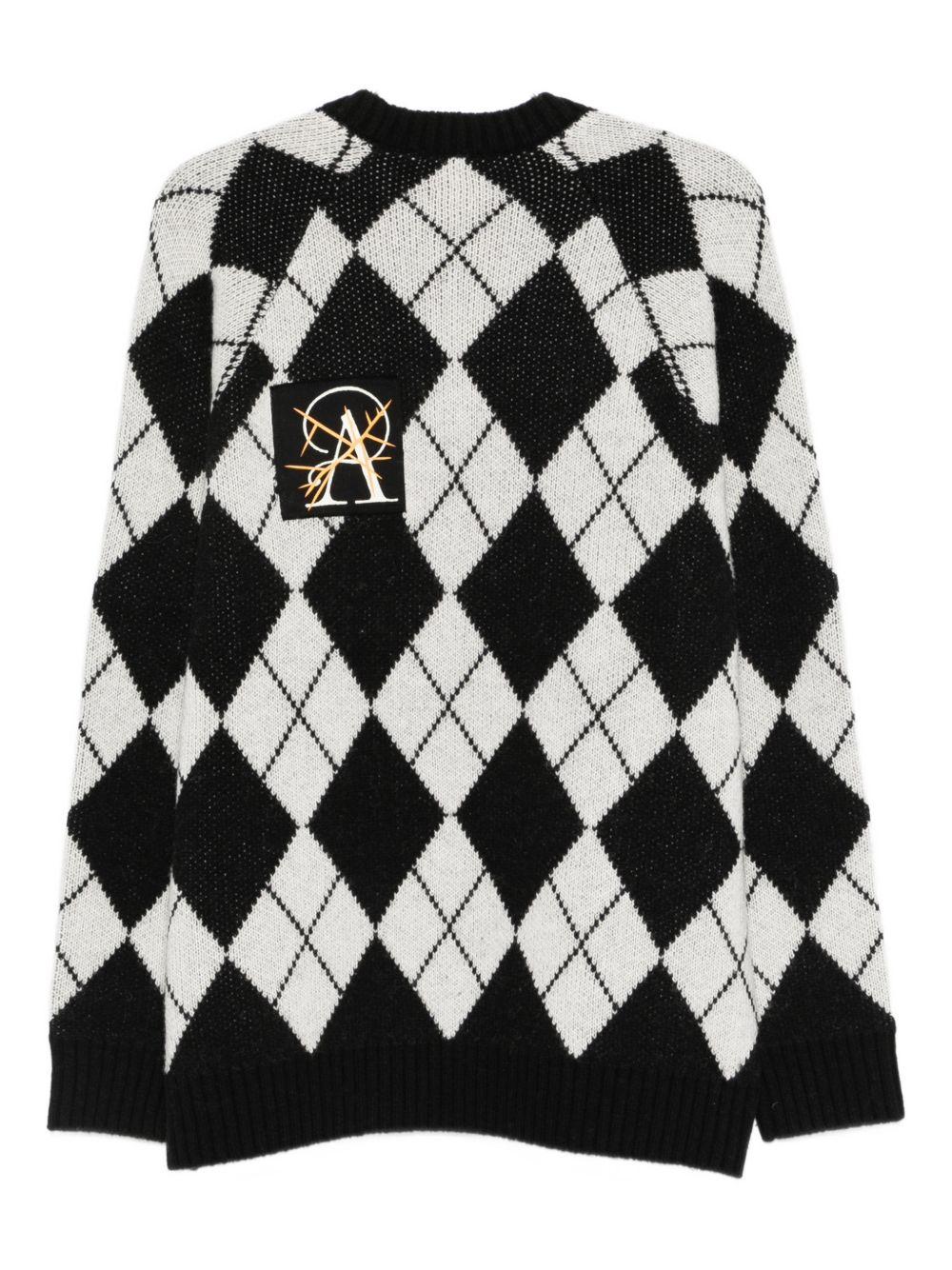 Maglione a rombi in nero Undercover - uomo 