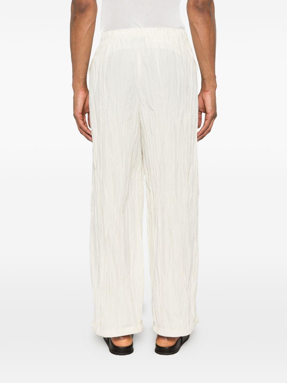 pantaloni plissettati in bianco gongdid design - uomo 